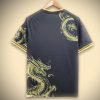 Camiseta aficionado Real Madrid estilo concept con dragón dorado