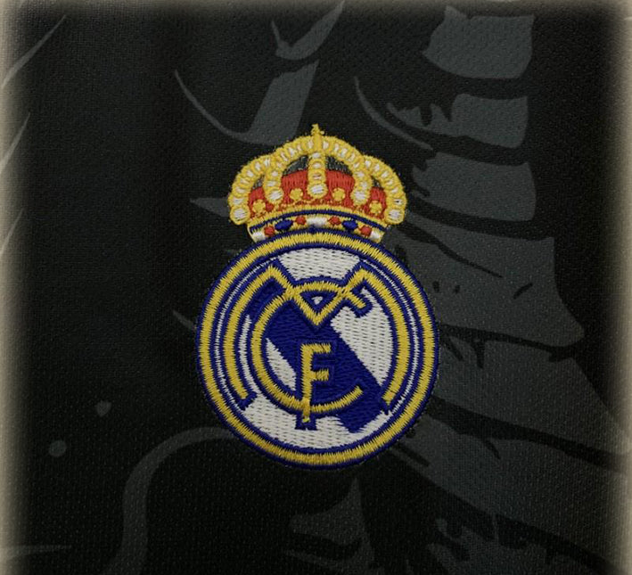 maillot-de-football-concept-real-madrid-dragon-violet-saison-2526 Camiseta de fútbol concept Real Madrid dragón violeta temporada 2526