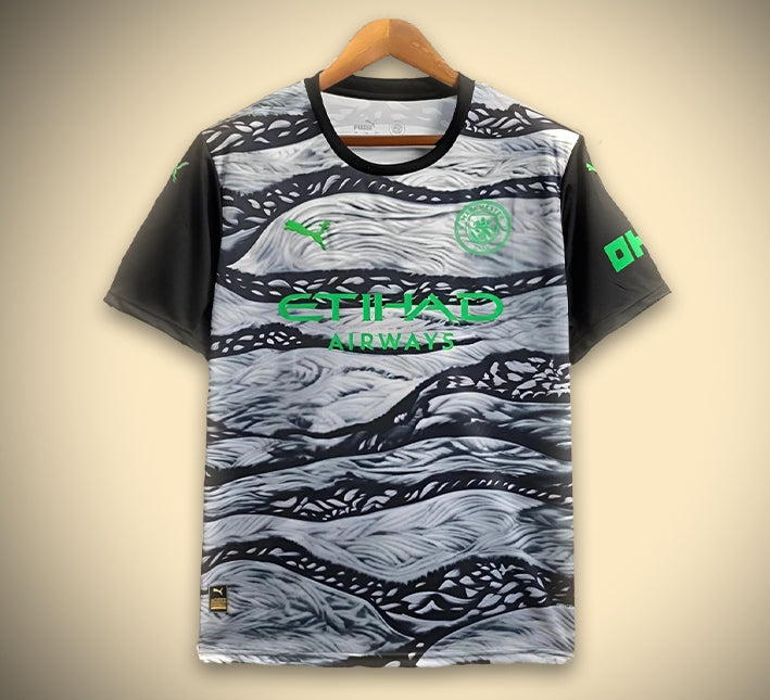 Camiseta de fútbol del Manchester City color negro y gris corte deportivo