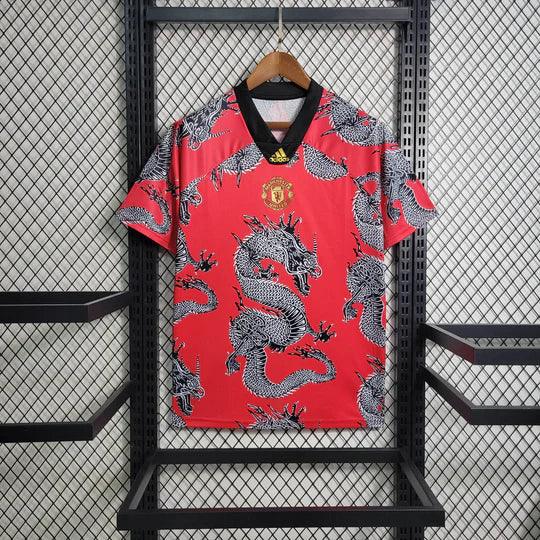 76D86723E57E14BEFEC6E59BE47384F1_540x_8f66707a-0066-4af1-89c9-02258eb91a91.jpg Maillot Manchester United Retro 2019-2020 Dragon