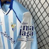 89189332-E323-42D5-8D81-CA31A9F4EC7A.jpg Maillot Malaga Domicile 2025/26